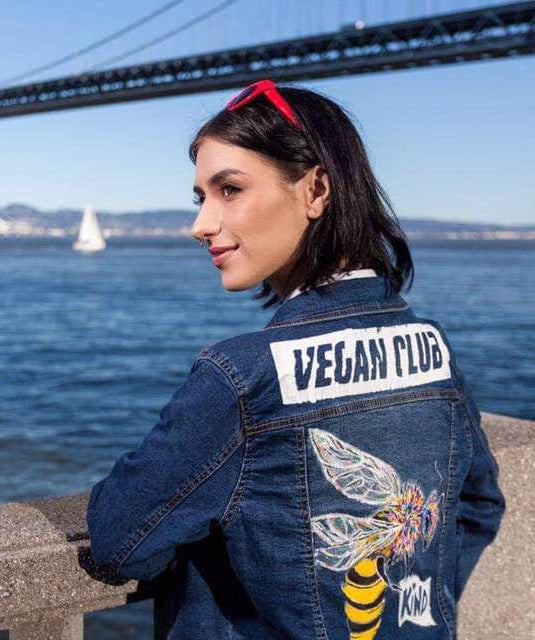 SOLD - Upcycled Jean Jacket Vest Vegan Club featuring a bee by artist Brandi Jae