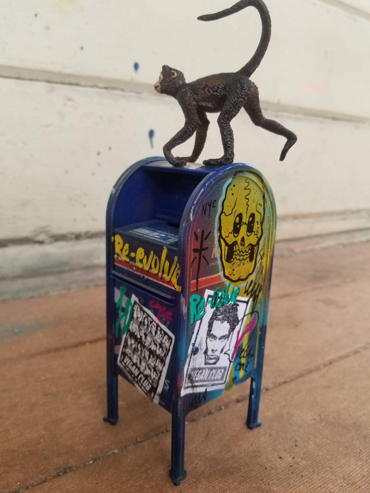 USPS Mailbox Collectible with monkey on top tagged by Vegan Club, art by @_actions_not_words