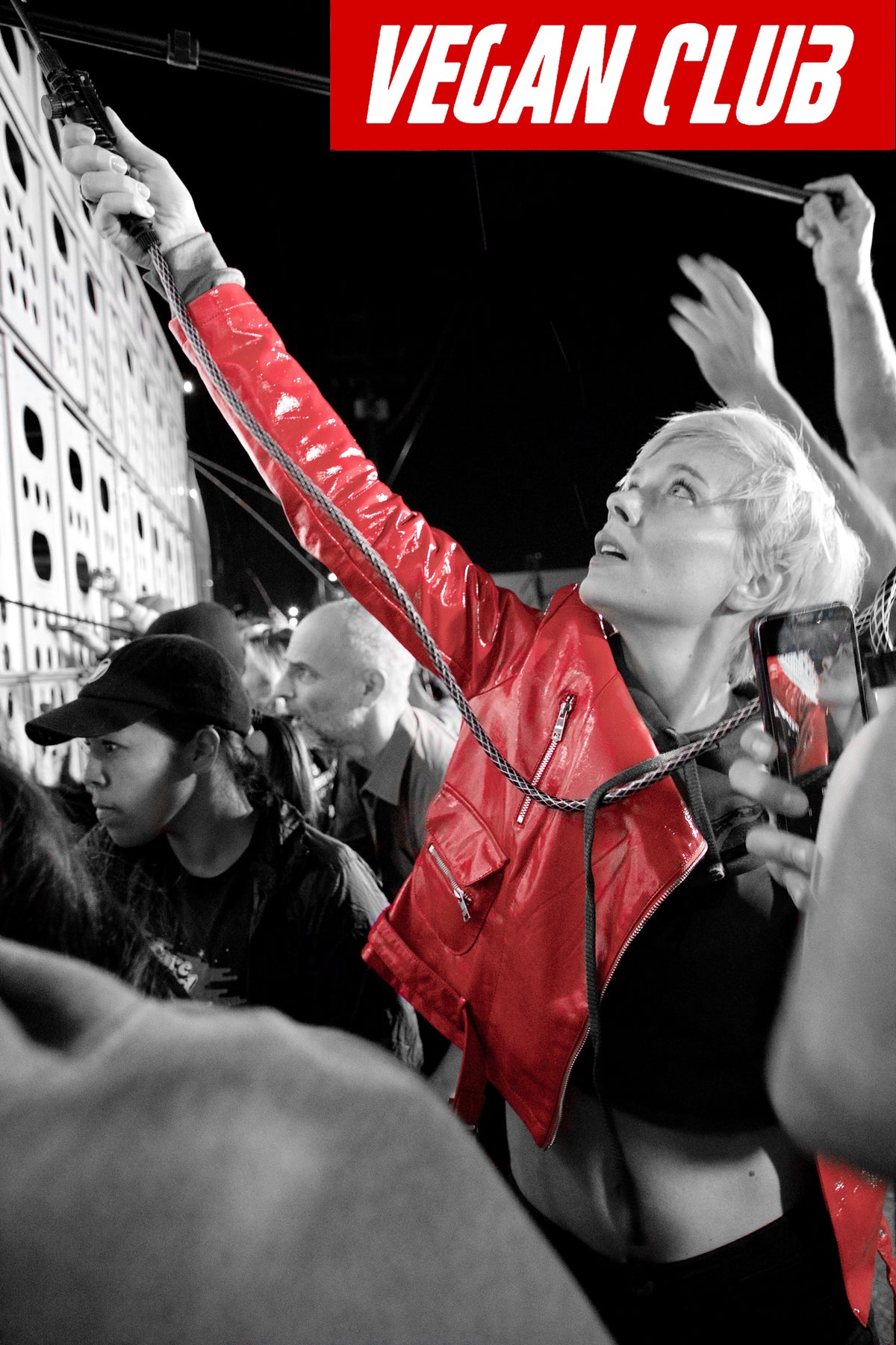 Nina Bergman giving water to the pigs at the pig vigil - photography by Bobby Sud